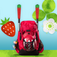 Strawberry Smash bat handle cover with red strawberry pattern design on a softball or baseball bat in a baseball backpack